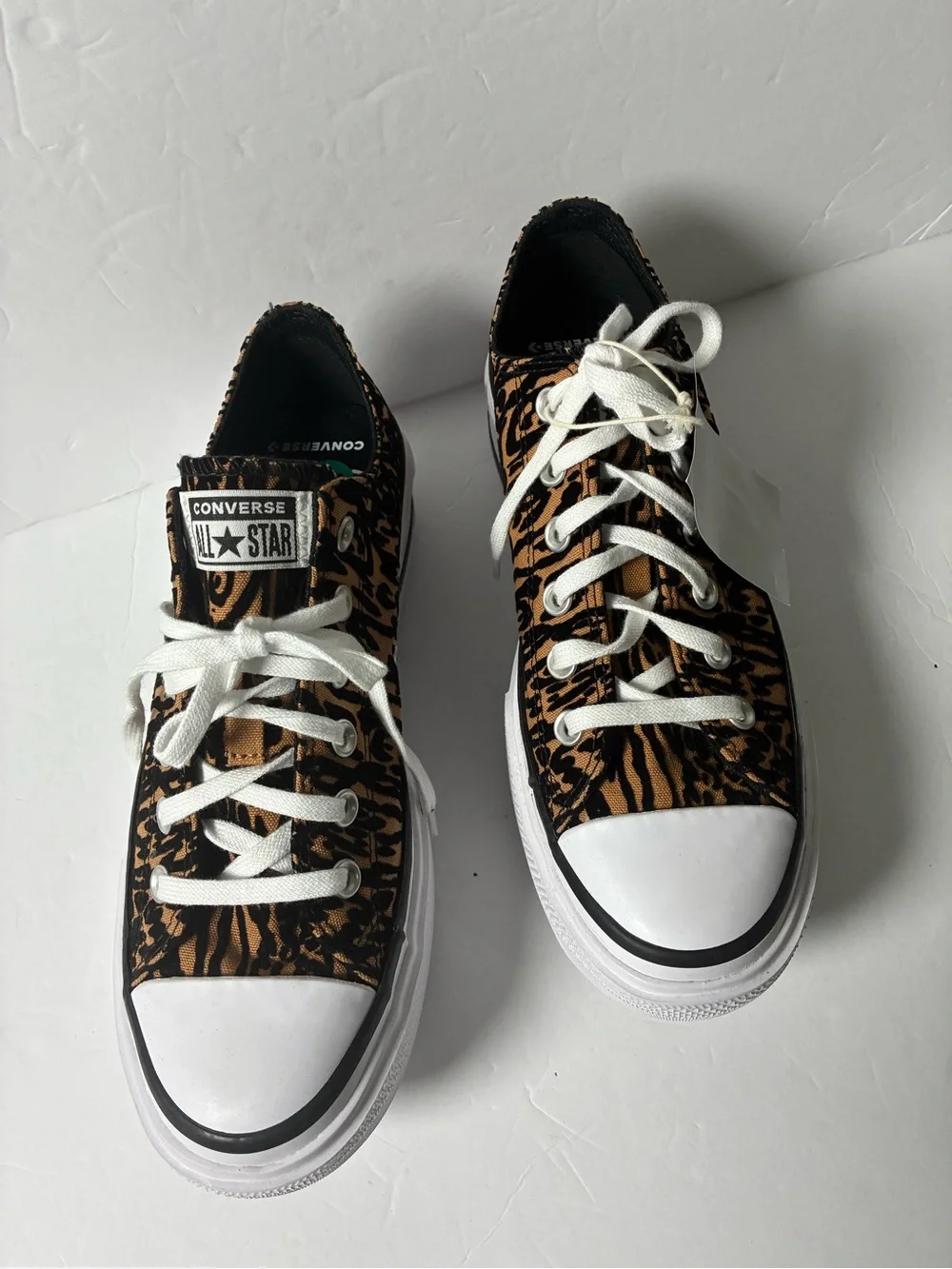 Converse Low Top Sneakers in Black, Brown & White Animal Print